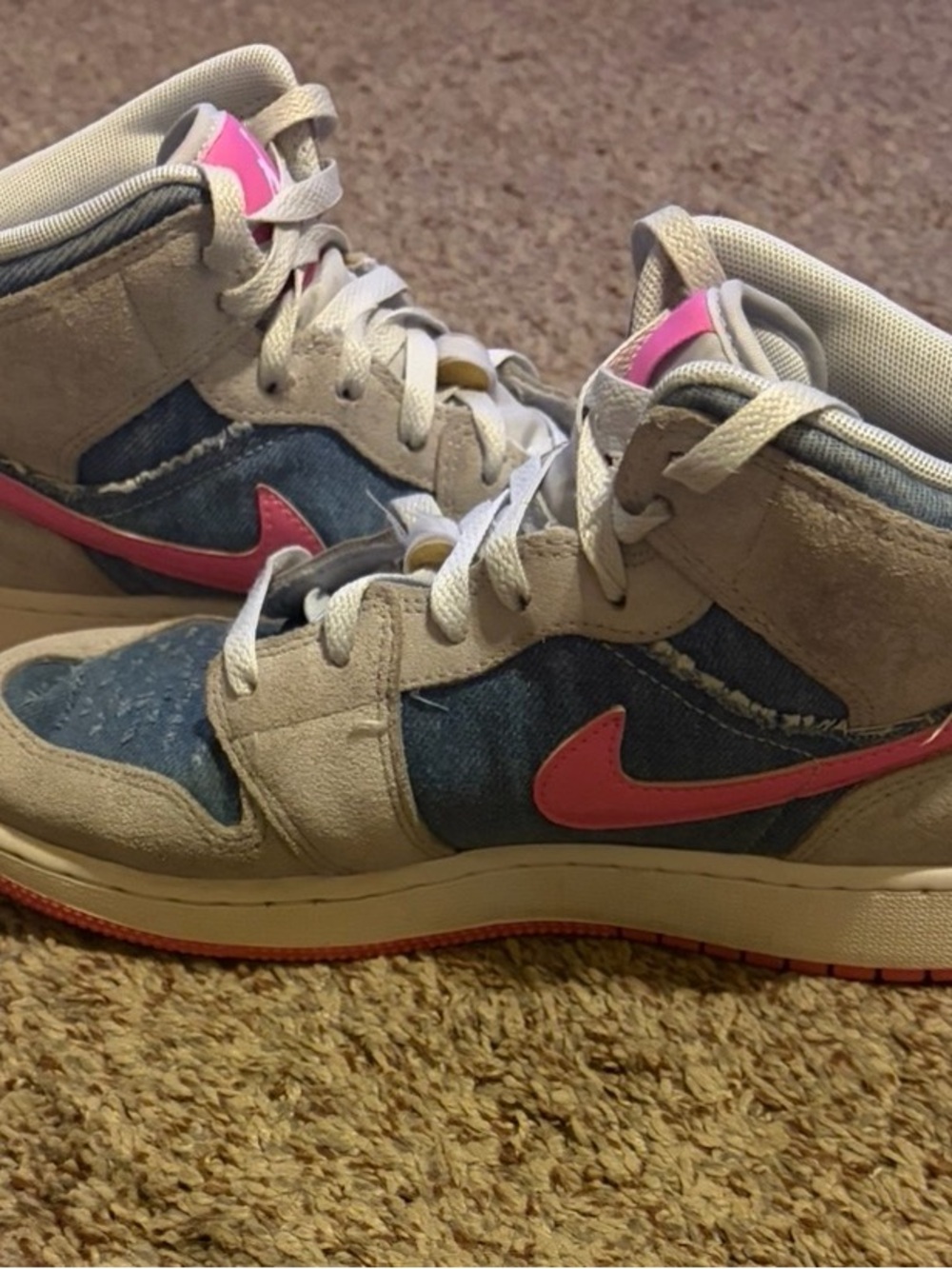 Nike Air Jordan pink and denim high tops women’s size 8 1/2 or 7 youth